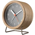 Wooden Alarm Clock With Gray Dial White Hands And Orange Second Hand On Metal Stand