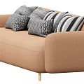 Beige Upholstered Sofa With Multiple Geometric Patterned Pillows And Gold Metal Legs
