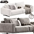 Velvet Two Seater Sofa In Gray And White With Soft Pillows Decorative Balls And Throw Blanket
