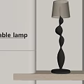 Modern Black Floor Lamp With Spiral Design And Cream Shade On Wooden Shelf