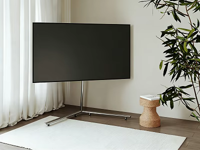 Large Screen TV on Metal Tripod Stand with Wicker Stool Green Plant and White Rug 3d model