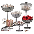 Colorful Candy Assortment in Metal Pedestal Bowls and Glass Jars with Sweets