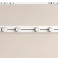 White Control Panel Featuring Multiple Round Knobs On Light Background