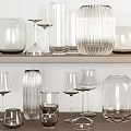 Transparent Wine Bottles And Wine Glasses Neatly Arranged On Two Wooden Shelves