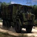 Military Transport Truck With Camouflage Pattern And Large Off Road Tires