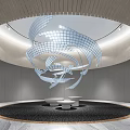 Modern Hotel Lobby with Spiral Art Installation Circular Ceiling Gray Walls and White Seating