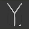 Y Shaped Slingshot With White Body Black Elastic Bands Base And Marbles
