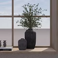 Green Plant In Ceramic Vase On Windowsill With Outdoor Scenery And Decorative Items