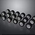Multiple Car Tires With Silver Alloy Rims Displayed On Black Background 3d model