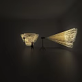 Creative Decorative Projection Lighting with Artistic Silhouette Designs in Indoor Display Setting