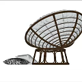 Modern Shell Shaped Leisure Chair With Brown Frame White Cushion And Patterned Pillow