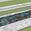 Rockery Stones in Front With Green Grass White Sand Wavy Patterns And Blue Water