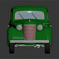 Vintage Green Classic Car With Rounded Body Spare Tire And Retro Design