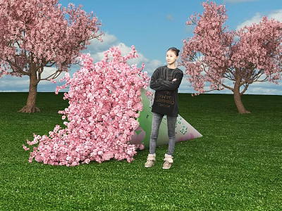 Scenic Floral Installation With Pink Cherry Blossoms Green Grass Blue Sky And Person Standing 3d model