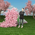 Scenic Floral Installation With Pink Cherry Blossoms Green Grass Blue Sky And Person Standing