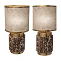 Elegant Table Lamps With Cream Colored Shades Brown Textured Bases And Gold Metal Trim