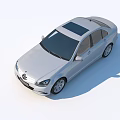 White Mercedes Benz Sedan With Modern Exterior Design And Front Grille Headlights