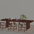 Modern Tea Table And Chairs With Wooden Top Metal Frame And Potted Plant