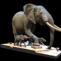 Realistic Elephant Sculpture Featuring Adult And Baby Elephants On Base