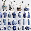 Assorted Blue and White Ceramic Vessels with Traditional Decorative Patterns and Different Shapes