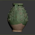 Ancient Ceramic Jug With Green Glaze Bulbous Decorations Circular Patterns And Terracotta Base