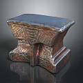 Vintage Bronze Colored Stool With Intricate Carved Patterns And Decorative Base