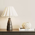 Stylish Table Lamp With Wooden Cone Base Pleated White Lampshade And Decorative Vase On Books