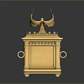 Golden Ornate Chest With Wing Decorations And Intricate Carved Patterns On Reflective Base