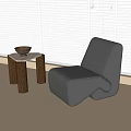 Modern Black Single Sofa With Side Table And Bowl Near Window Blinds 3d model