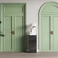 Light Green Hinged Doors With Square Arched Top Design Sculpture and Potted Plant