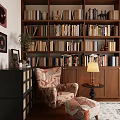 Study Room Interior With Wooden Bookshelves Full Of Books Patterned Armchair And Table Lamp
