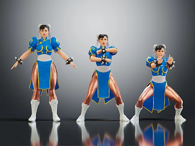 Three Female Characters In Blue And Gold Outfits With Different Fighting Poses 3d model