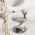 Modern Side Table With Glass Top Spiral Base And Pencils Magazines