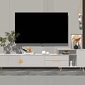 Modern White TV Stand With Decorative Items Potted Plant Flat Screen TV And Wall Art