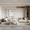 Modern Minimalist Living Room Featuring Beige Sofa Round Coffee Table Large Rug And Wall Painting