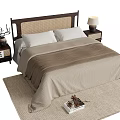 Double bed with wicker headboard neutral bedding on area rug nightstands and table lamp