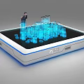 Interactive Commercial Device Displaying Blue Glowing 3D City Model on Black Screen with Small Figure