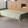Light Green Tablecloth Covered Wooden Table With Pendant Lights And Wooden Cabinet Near Window