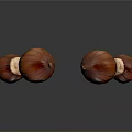 Four Shiny Brown Chestnuts Floating On Black Background With Reflections