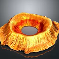 Golden Textured Decorative Object With Circular Hollow Center And Petal Like Edges