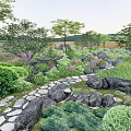 Natural Stone Garden Path Paving With Green Plants Trees And Colorful Flowers