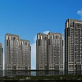 Modern High Rise Residential Buildings With Waterfront Greenery And Blue Sky View
