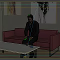 Man Sitting On Red Sofa Holding Mobile Phone With White Table Cup And Box