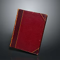 Vintage Hardcover Book With Red Cover And Brown Trim Against Dark Background