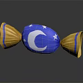 Blue Candy With White Moon And Stars Design And Gold Wrapping