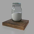 Books Magazines Display With Glass Jar On Wooden Board And White Powder