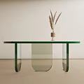Oval Shaped Glass Top Dining Table With Green Legs And Pampas Grass Vase