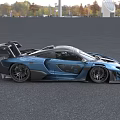 McLaren Blue Sports Car With Aerodynamic Rear Wing And Sporty Exterior Design