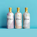 Bfre Beverage Bottles With Pink Beige Grey Colorful Design On Light Blue Background