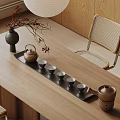 Natural Style Tea Set With Brown Teapot Cups Black Tray And Vase On Wooden Table